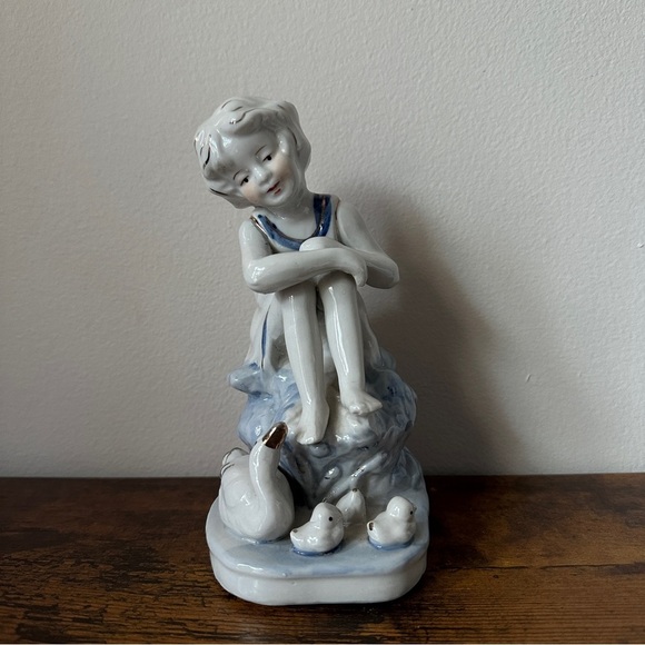 Charming Porcelain Figurine with Blue Accents - Picture 2 of 4